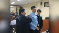 Heri Achmadi Kepala Desa (Kades) Trosobo Nonaktif, Kecamatan Taman didakwa Kasus Pungli PTSL