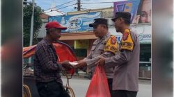 Jum’at Berkah Berbagi Polsek Ngadiluweh, Bagikan Kotak Untuk Masyarakat